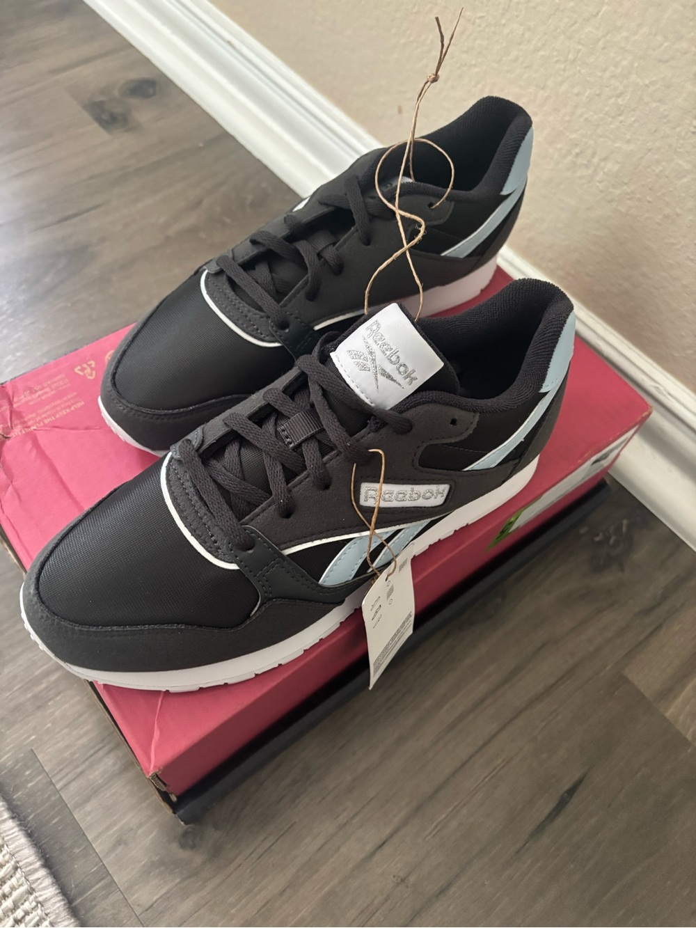 Reebok women’s Navy Blue Sneakers with Light Blue Accents
